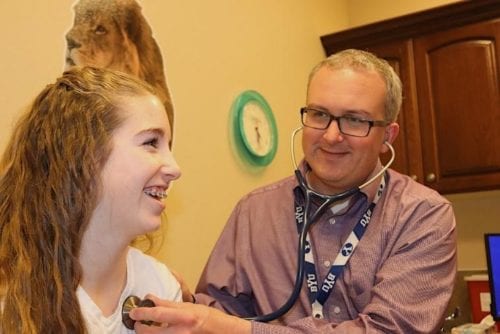 Dr. Joshua Smith, a pediatric endocrinologist, examining a young patient in Idaho Falls or Pocatello at Rocky Mountain Diabetes Center. 